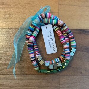 Tell your tale rainbow bracelets